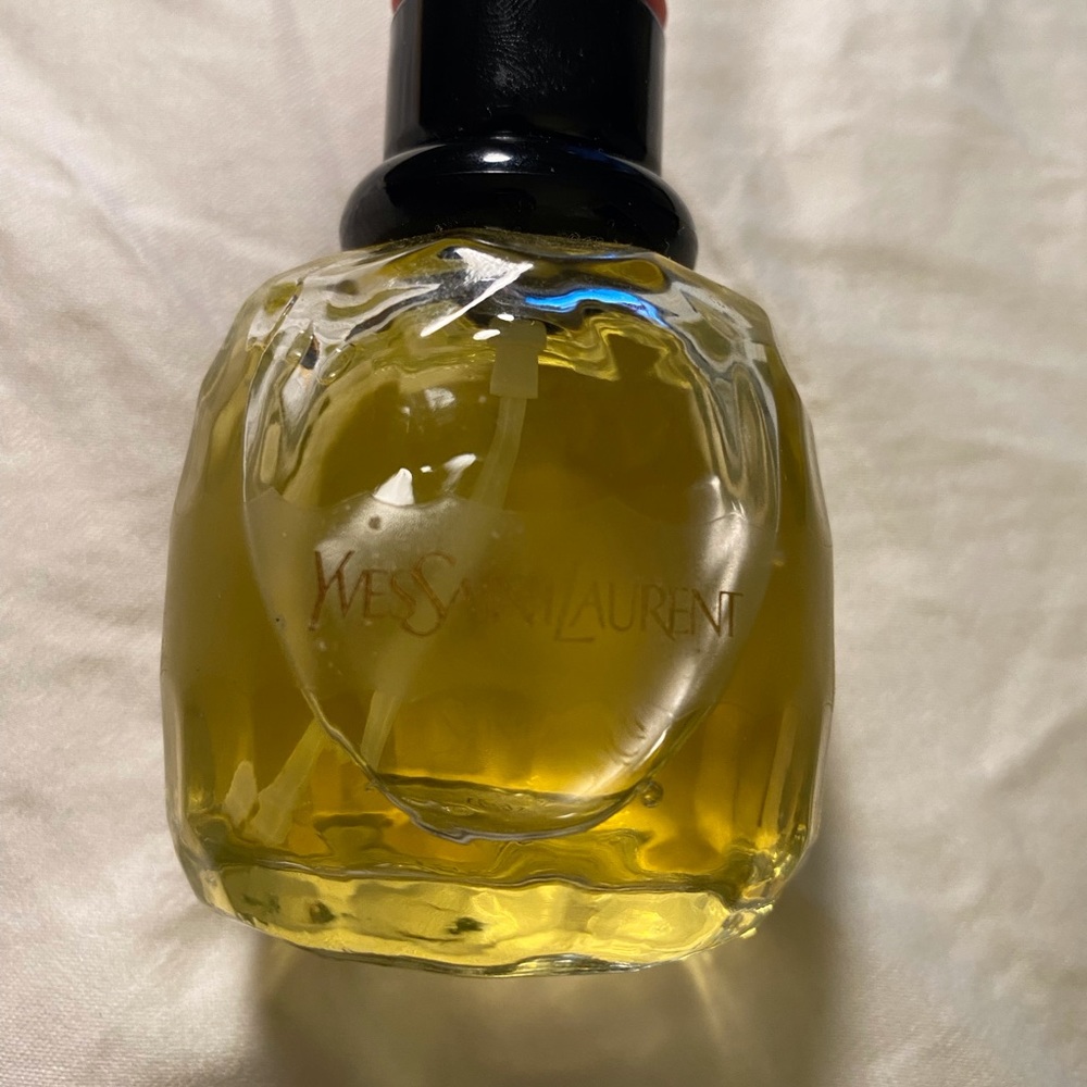 YSL LADIES THIS FRAGRANCE IS A WARM, MILD..BUT A RICH SMELL